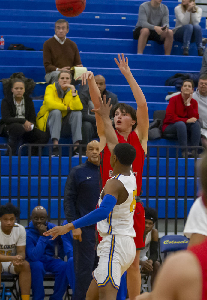 Lord Botetourt's (34) Conner Tilley shoots from deep against William Fleming's (24) Donovan St. Juste.